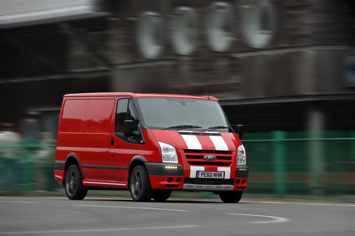 This archival image documents the 2010 Ford Transit Mark IV 140 SportVan action shot on road and is preserved in the Ford Heritage Vault as part of Ford Motor Company's historic photographic archive. Free for personal, non-commercial use. Ford Her...