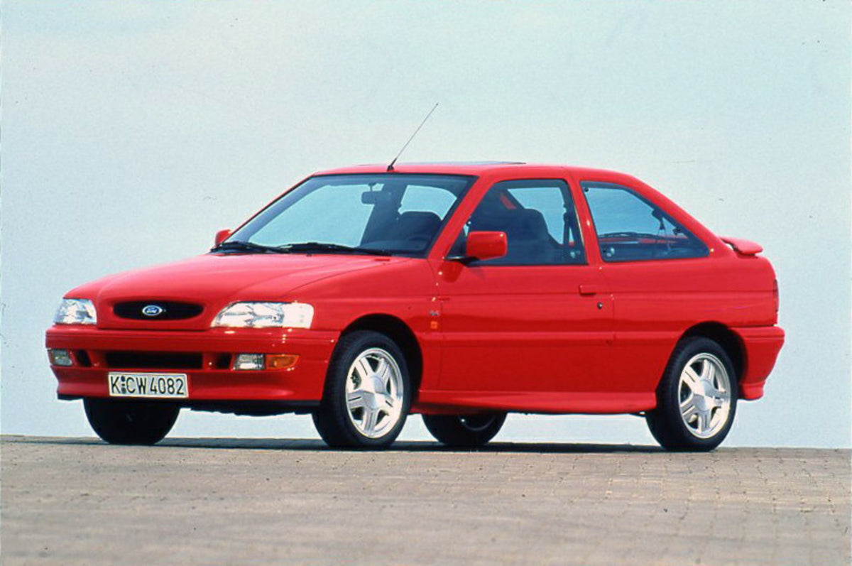 This archival image documents the 1993 Ford Escort Mark V RS2000 4x4 with scenic blue sky and is preserved in the Ford Heritage Vault as part of Ford Motor Company's historic photographic archive. Free for personal, non-commercial use. Ford Herita...