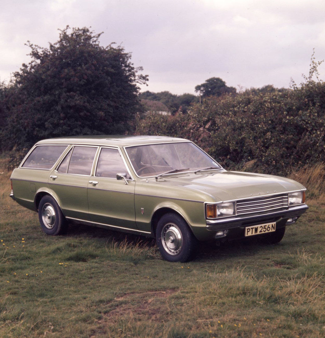 This archival image documents the 1974 Ford Granada Mark I Estate in scenic field with trees and is preserved in the Ford Heritage Vault as part of Ford Motor Company's historic photographic archive. Free for personal, non-commercial use. Ford Her...