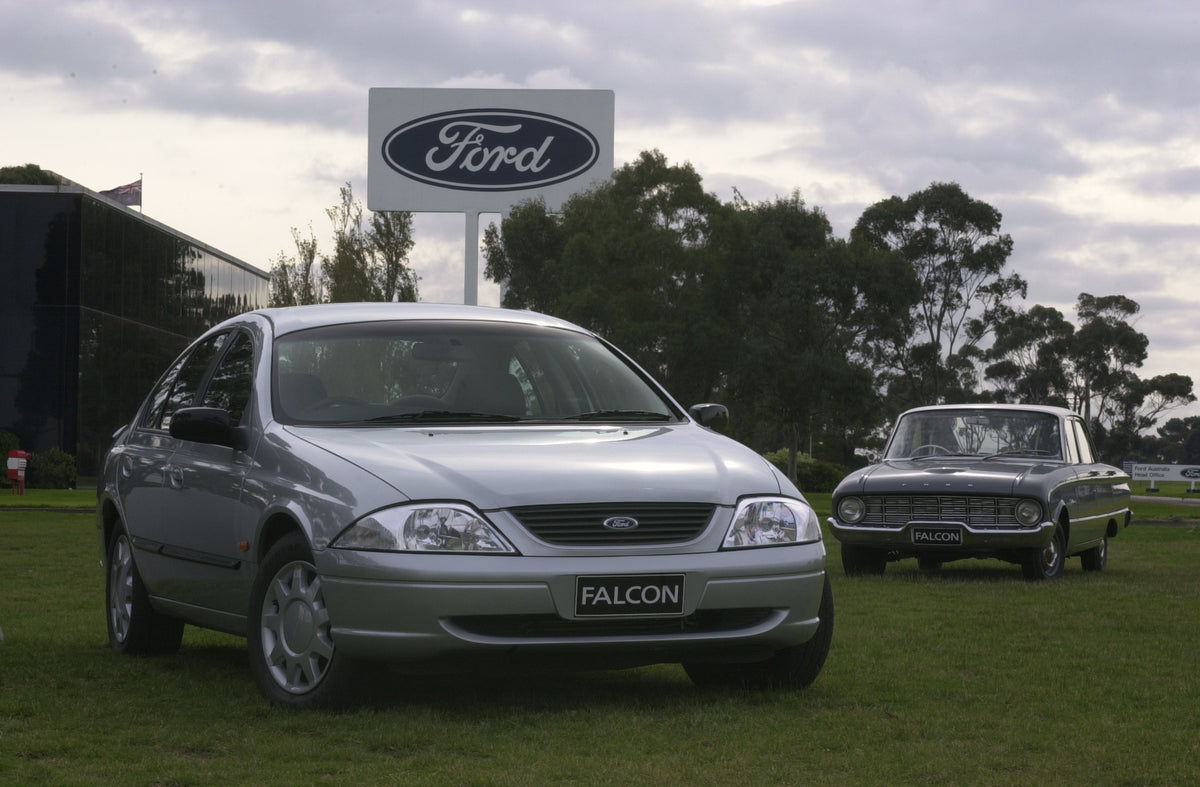 This archival image documents the 2000 Ford Falcon AU Series II and 1960 Ford Falcon with Ford sign and is preserved in the Ford Heritage Vault as part of Ford Motor Company's historic photographic archive. Free for personal, non-commercial use. F...