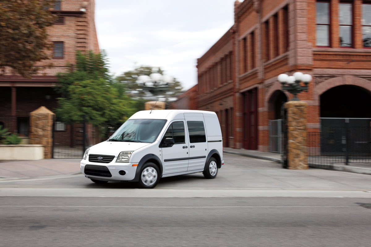 This archival image documents the 2012 Ford Transit Connect action shot on city street MS4992 and is preserved in the Ford Heritage Vault as part of Ford Motor Company's historic photographic archive. Free for personal, non-commercial use. Ford He...