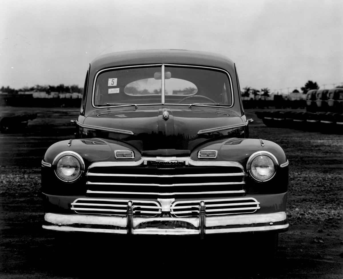 This archival image documents the 1946 Monarch Sedan front view on dirt road AR-2007-5 and is preserved in the Ford Heritage Vault as part of Ford Motor Company's historic photographic archive. Free for personal, non-commercial use. Ford Heritage ...