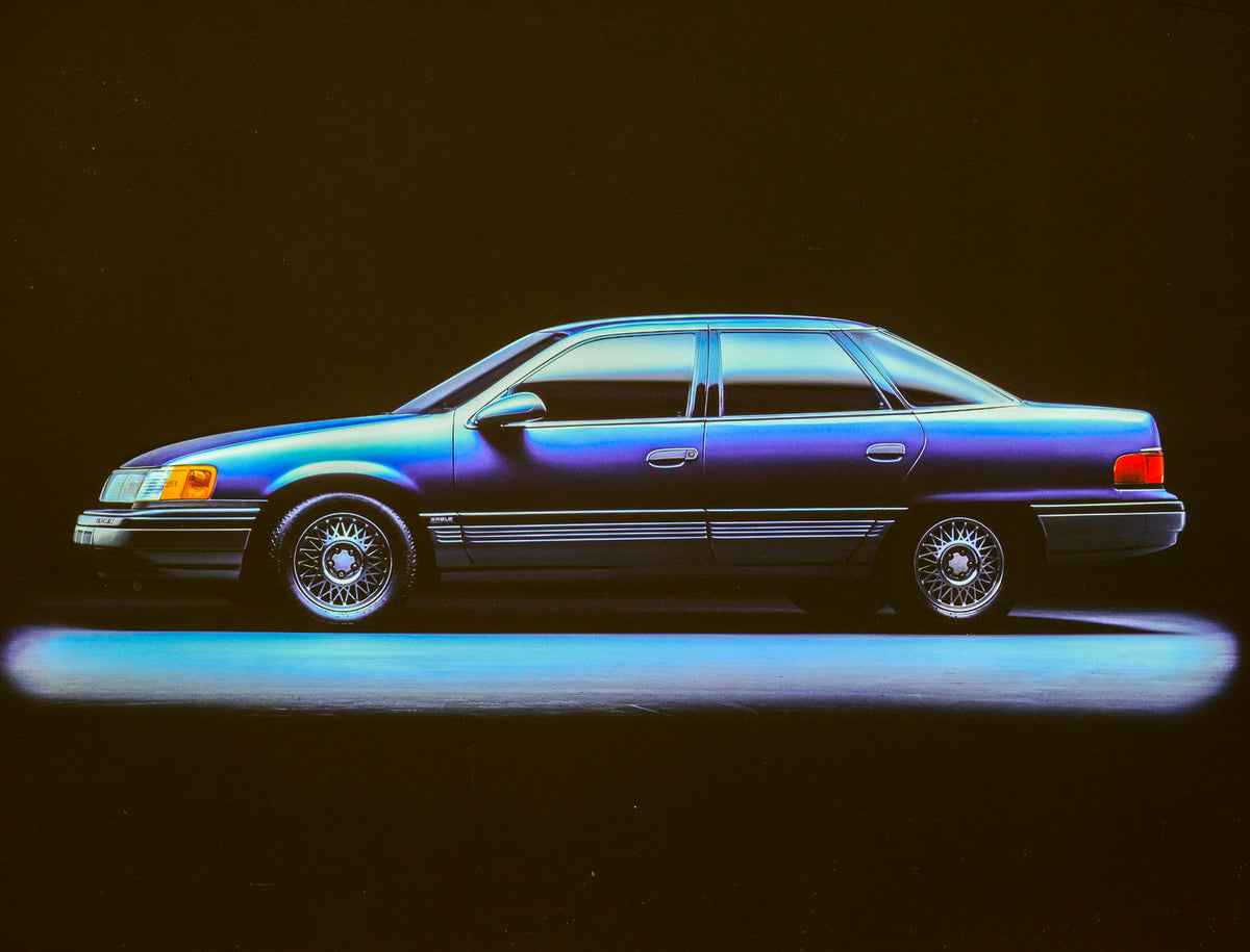 This archival image documents the 1986 Mercury Sable four-door and is preserved in the Ford Heritage Vault as part of Ford Motor Company's historic photographic archive. Free for personal, non-commercial use. Ford Heritage Vault reference AR-2001-...