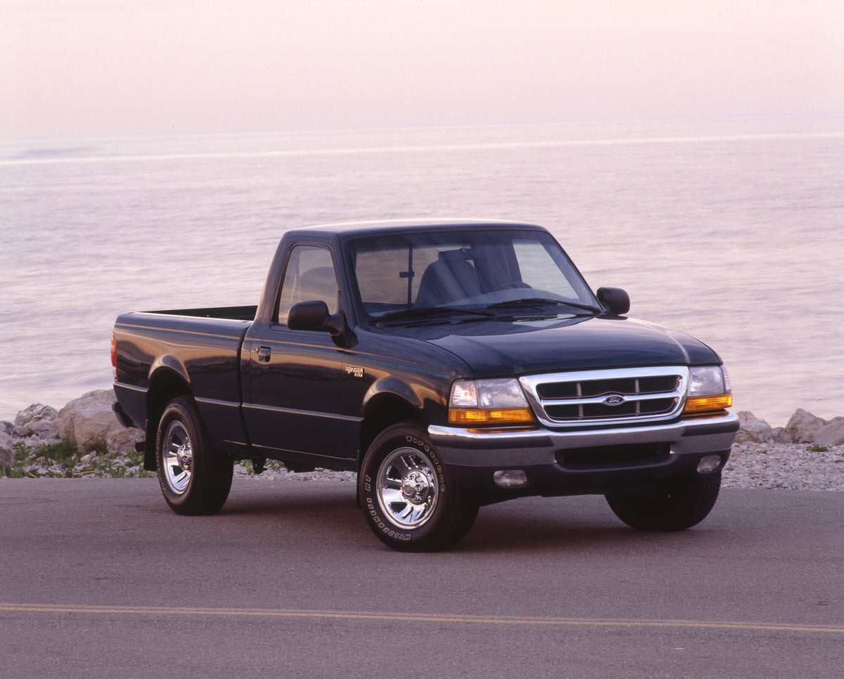 This archival image documents the 1998 Ford Ranger XLT regular cab and is preserved in the Ford Heritage Vault as part of Ford Motor Company's historic photographic archive. Free for personal, non-commercial use. Ford Heritage Vault reference AR-2...