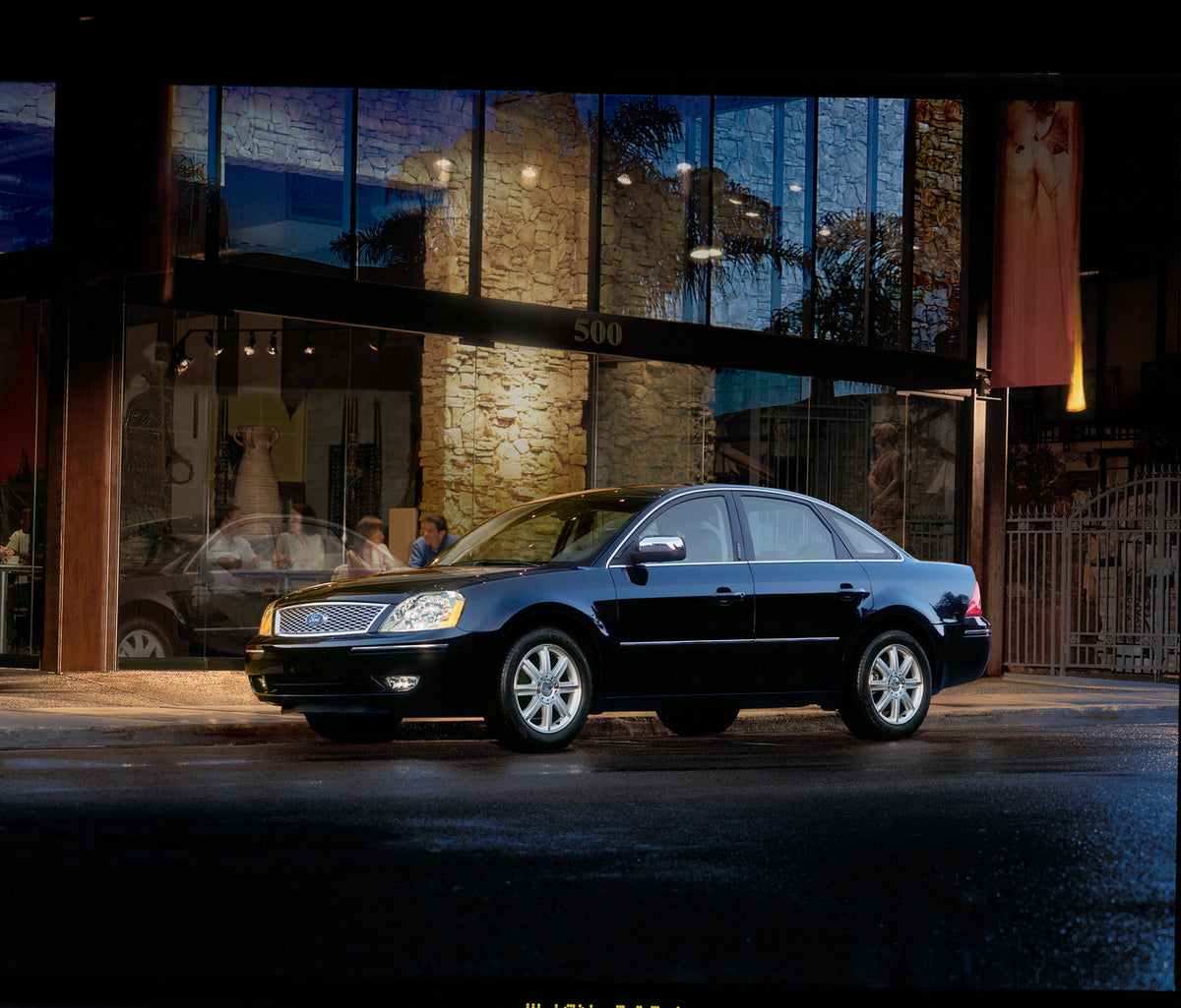 This archival image documents the 2006 Ford Five Hundred in city and is preserved in the Ford Heritage Vault as part of Ford Motor Company's historic photographic archive. Free for personal, non-commercial use. Ford Heritage Vault reference AR-200...