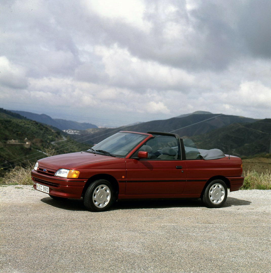 This archival image documents the 1990 Ford Escort CE-14 LHD in mountains in Spain and is preserved in the Ford Heritage Vault as part of Ford Motor Company's historic photographic archive. Free for personal, non-commercial use. Ford Heritage Vaul...