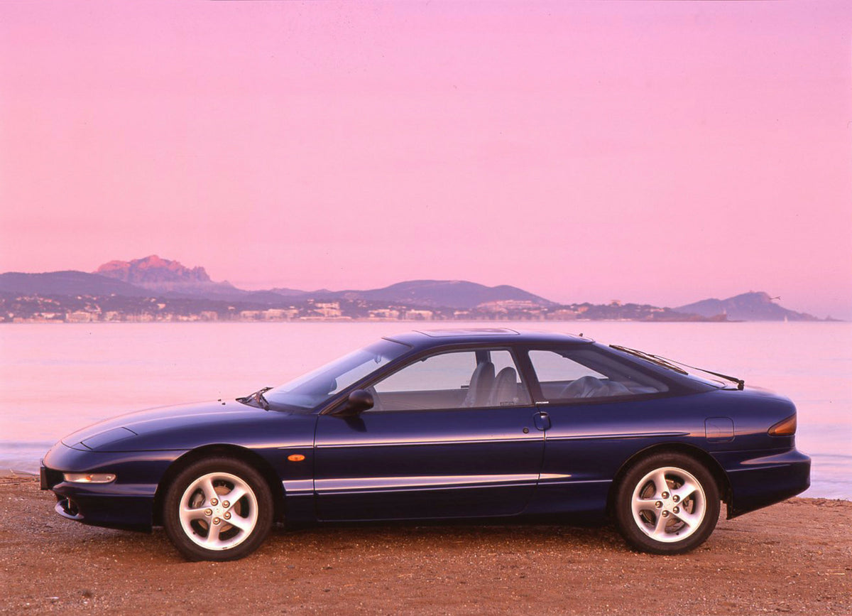 This archival image documents the 1994 Ford Probe Mark II on beach in Nice, France and is preserved in the Ford Heritage Vault as part of Ford Motor Company's historic photographic archive. Free for personal, non-commercial use. Ford Heritage Vaul...