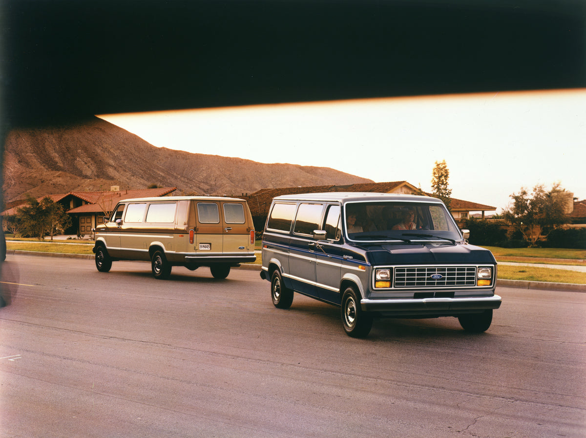 This archival image documents the 1988 Ford Econoline Club Wagon XLT vans and is preserved in the Ford Heritage Vault as part of Ford Motor Company's historic photographic archive. Free for personal, non-commercial use. Ford Heritage Vault referen...