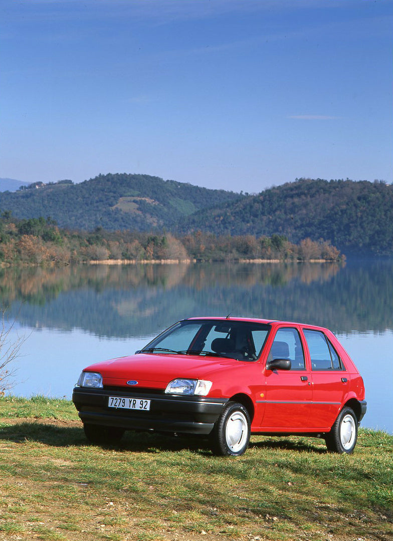 This archival image documents the 1994 Ford Fiesta Mark III near water and mountains in Nice, France and is preserved in the Ford Heritage Vault as part of Ford Motor Company's historic photographic archive. Free for personal, non-commercial use. ...