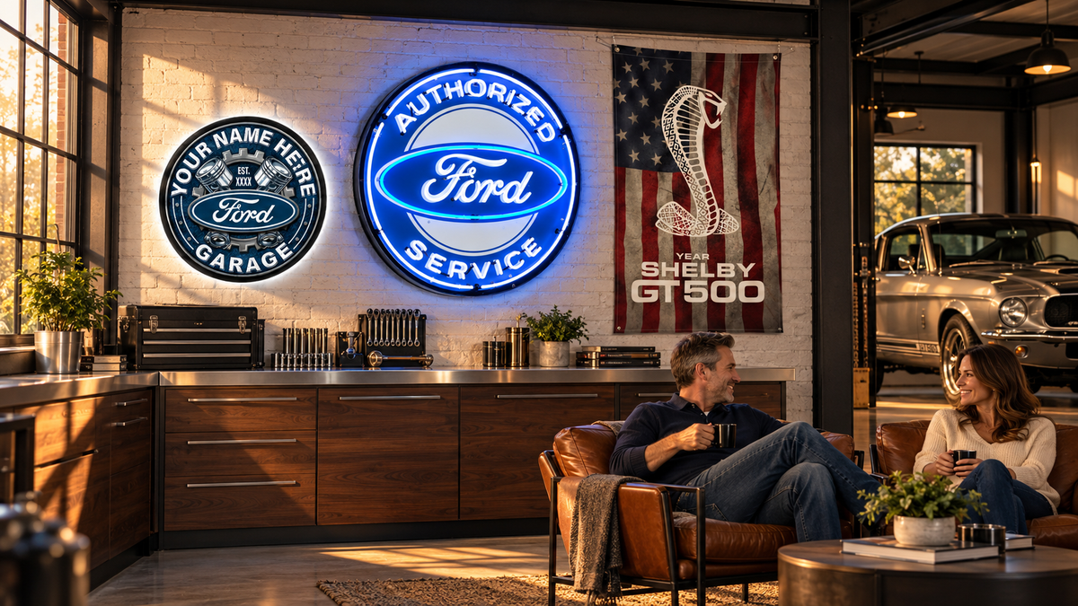 Ford and Shelby signs and a Shelby GT500 flag displayed in a private collector’s garage with a classic Mustang.